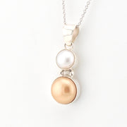Side View Silver White and Peach Pearl Necklace