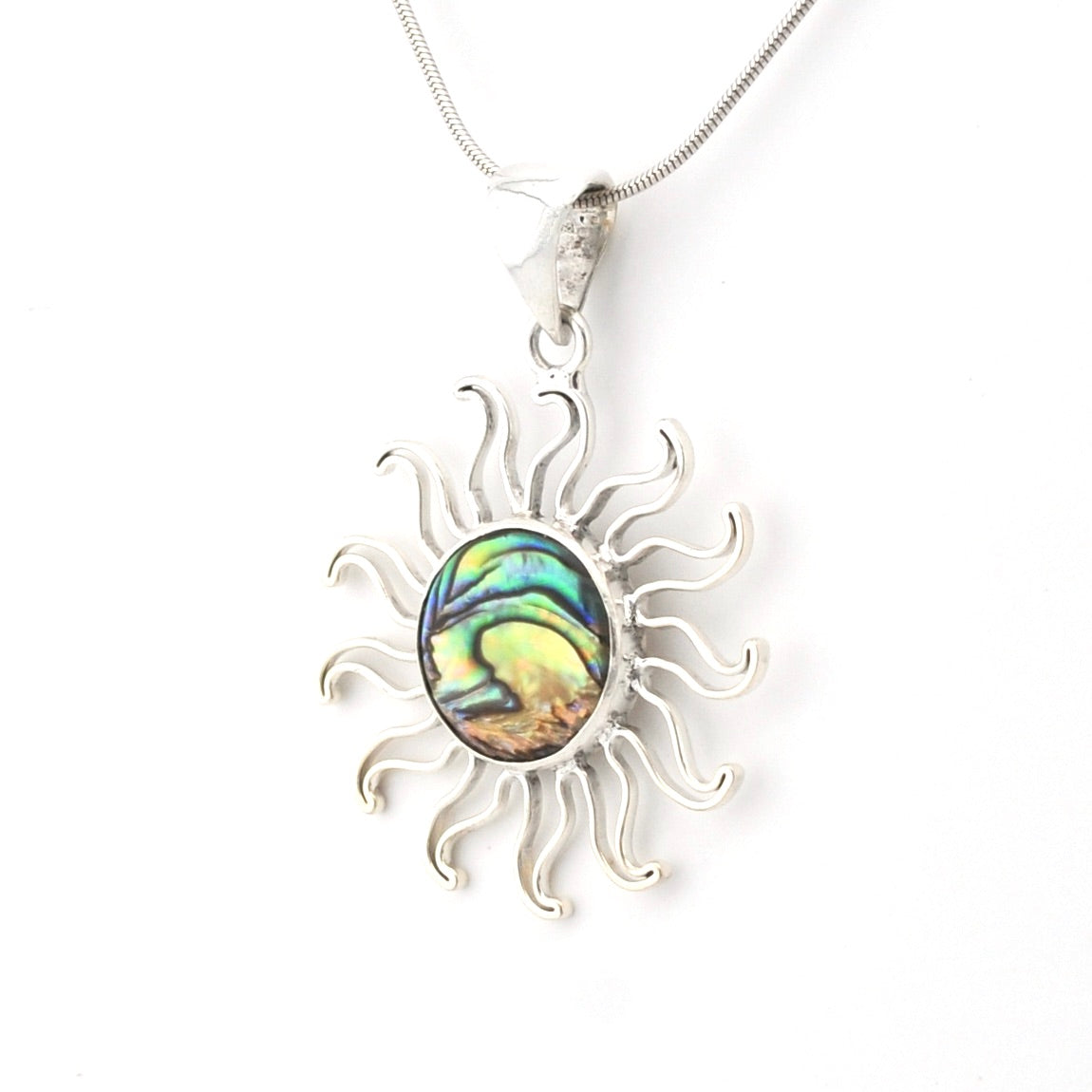 Silver sun-shaped pendant with a colorful center on a white background
