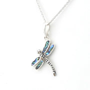 Silver dragonfly pendant with inlaid abalone on silver chain.