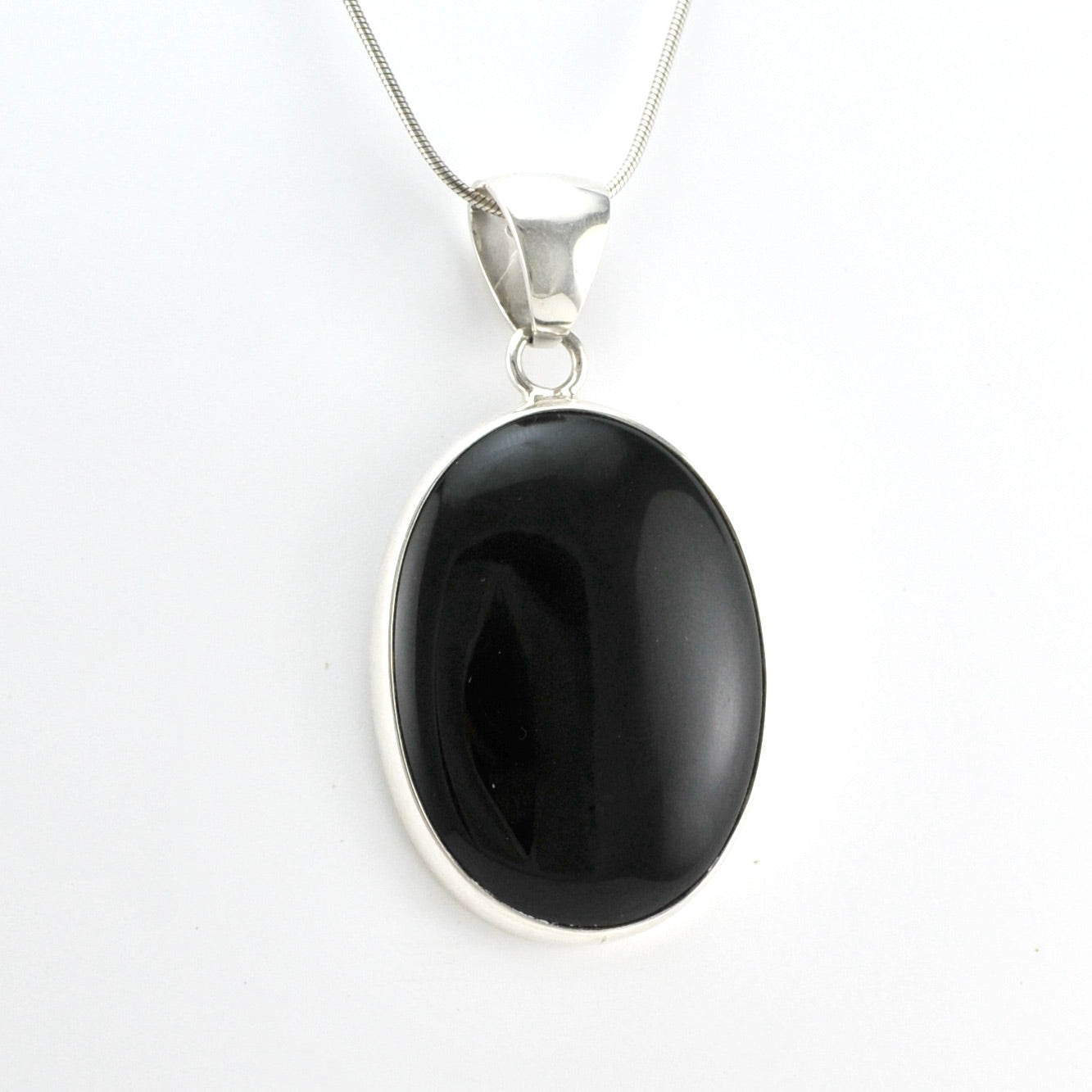 Side View Sterling Silver Black Onyx Oval Pendant