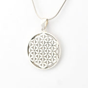 Silver necklace with a geometric pendant on a white background