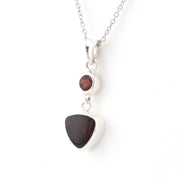 Side View Sterling Silver Garnet Round Trillion Necklace