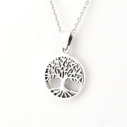 Silver tree of life pendant necklace on a white background