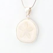Sterling Silver Sand Dollar Pendant on white background