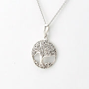 Silver tree of life pendant on a silver chain.