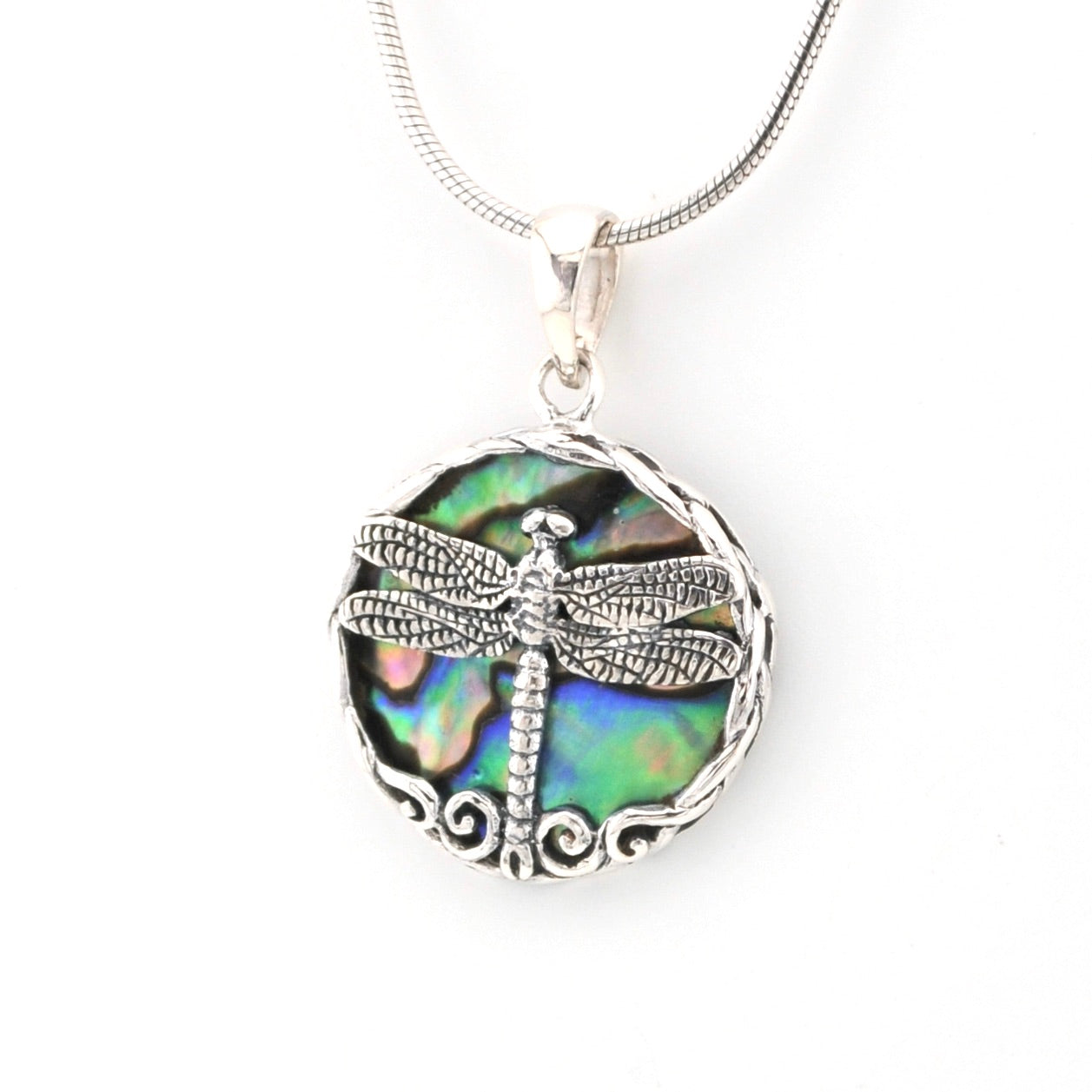 Dragonfly pendant necklace with abalone shell on a white background