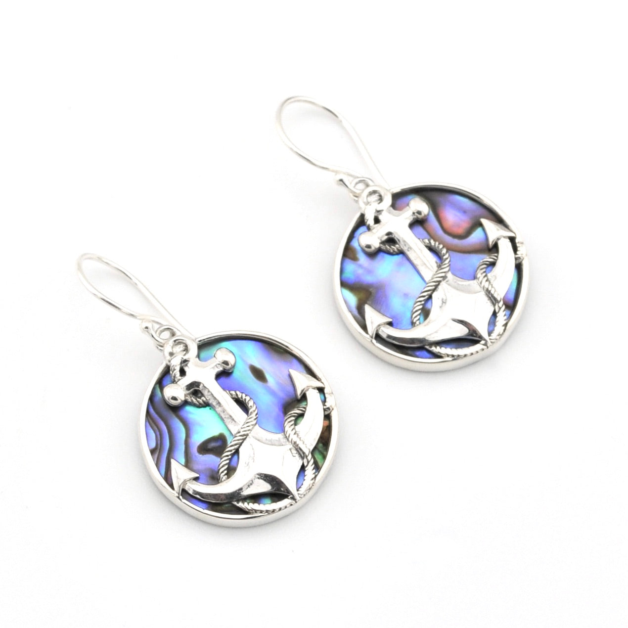 Pair of earrings with circular design and anchor detail on a white background