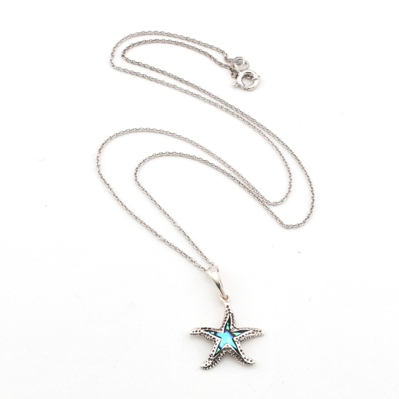 Starfish pendant necklace on a white background