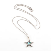 Starfish pendant necklace on a white background
