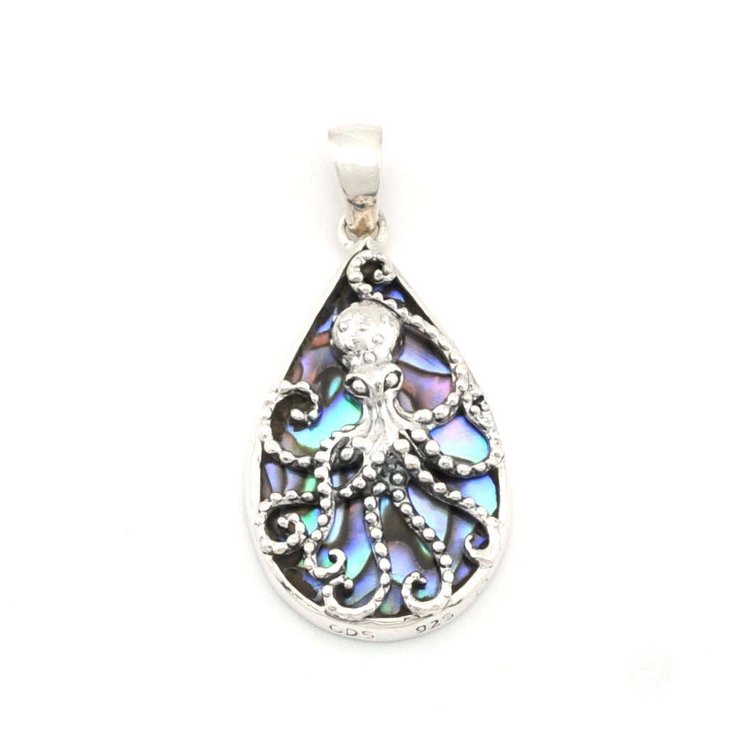 Teardrop-shaped pendant with abalone shell inlay on a white background