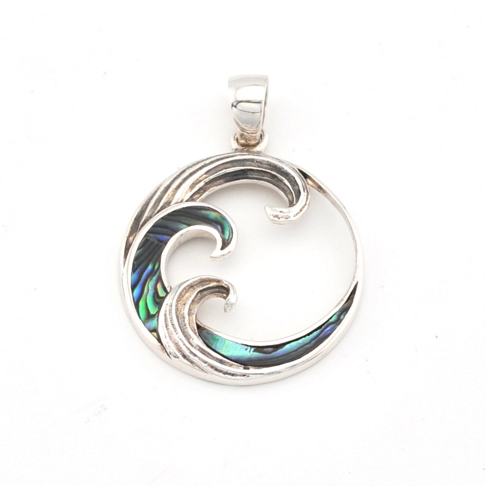 Silver pendant with abalone shell inlay on a white background