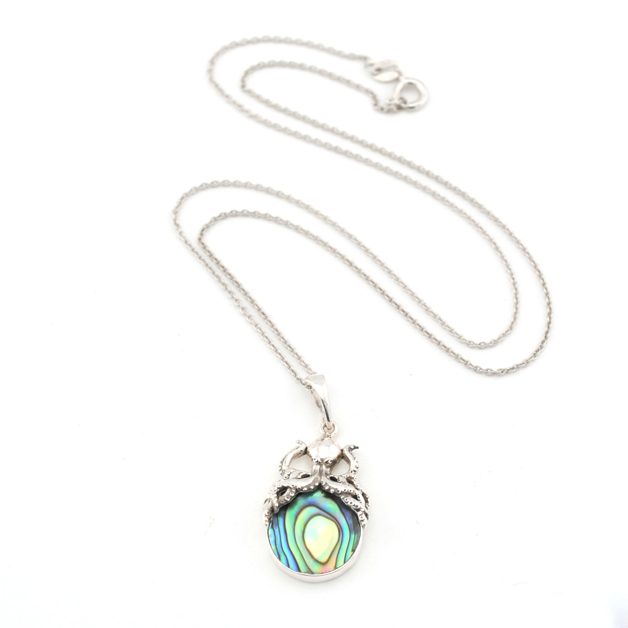 Necklace with a colorful pendant on a white background