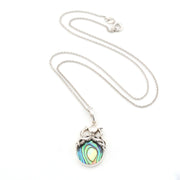 Necklace with a colorful pendant on a white background