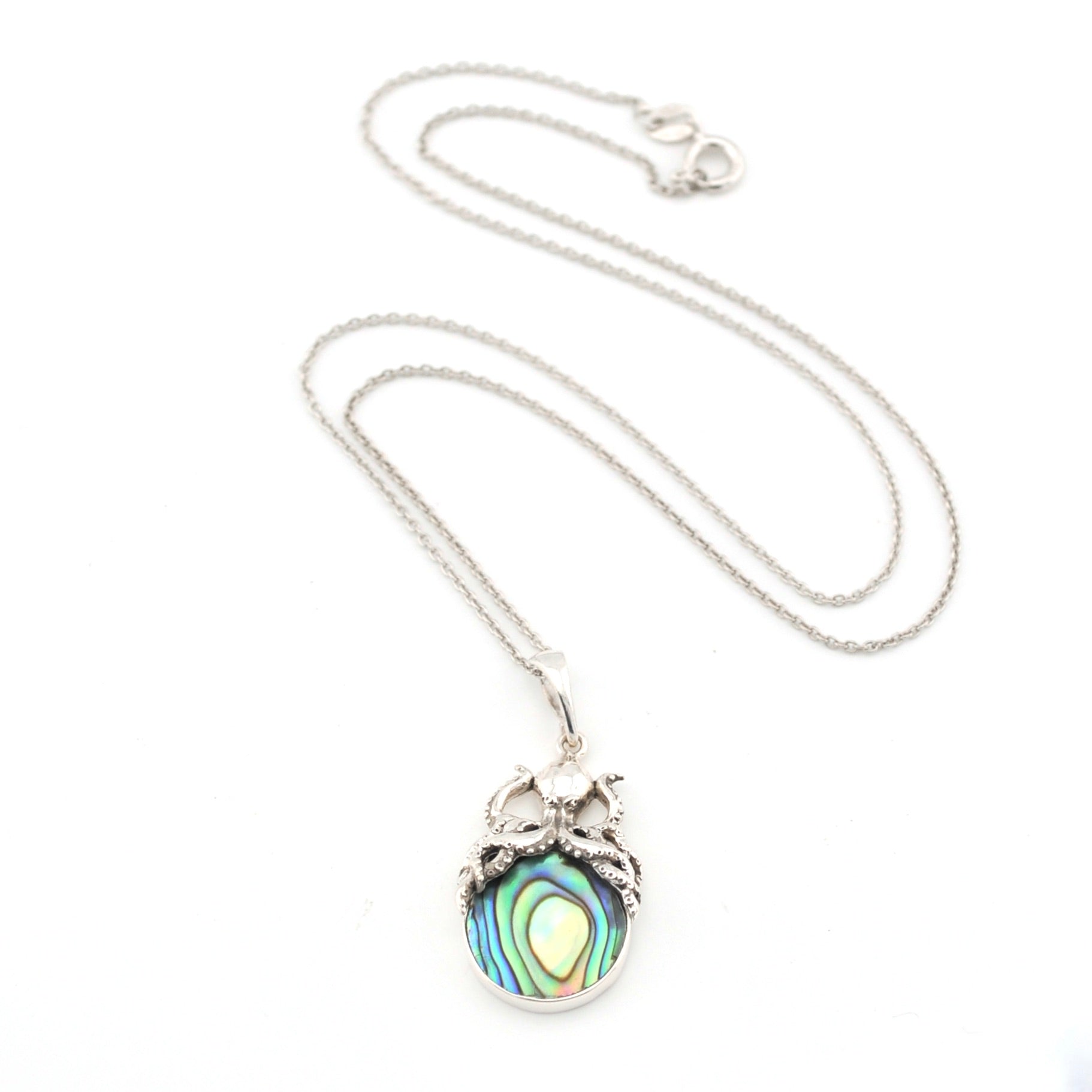 Necklace with a colorful pendant on a white background