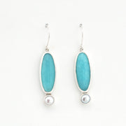 Handmade sterling silver dangle earrings with amazonite and pearl on white background
