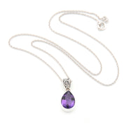 Necklace with a purple teardrop pendant on a white background