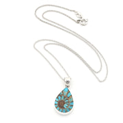 A silver teardrop pendant necklace featuring a turquoise and brown patterned stone, displayed on a clean white background.