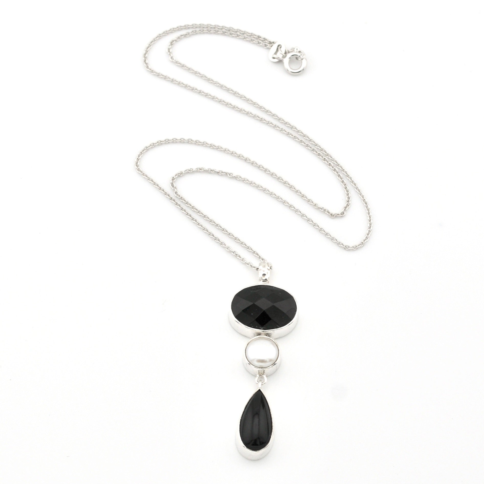 Necklace with black pendant on a white background
