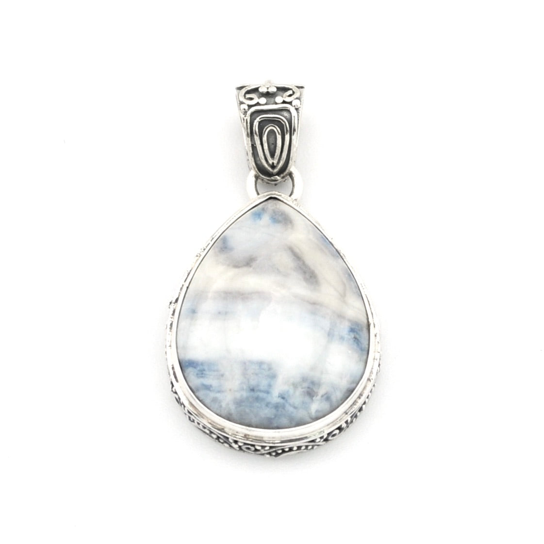 A sterling silver pendant featuring a teardrop-shaped scheelite gemstone with natural white and light blue marbling, set in an ornate silver bezel with a decorative bail.