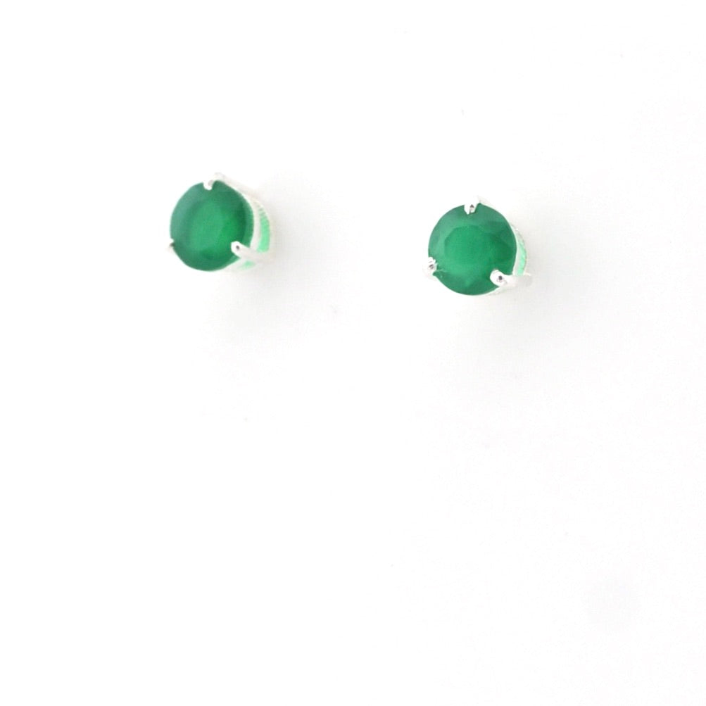 Pair of green stud earrings on a white background