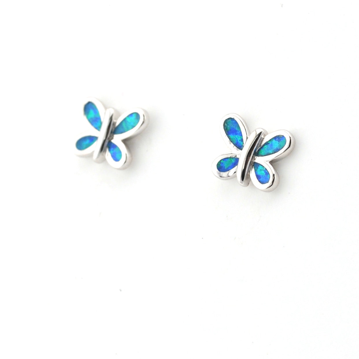Butterfly-shaped earrings with blue opal inlay on a white background