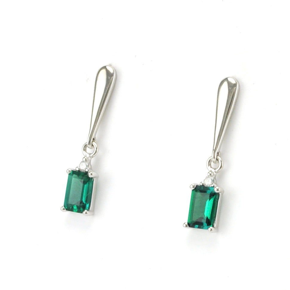 Silver Created Emerald 1ct Rectangle Diamond .04ct Earrings