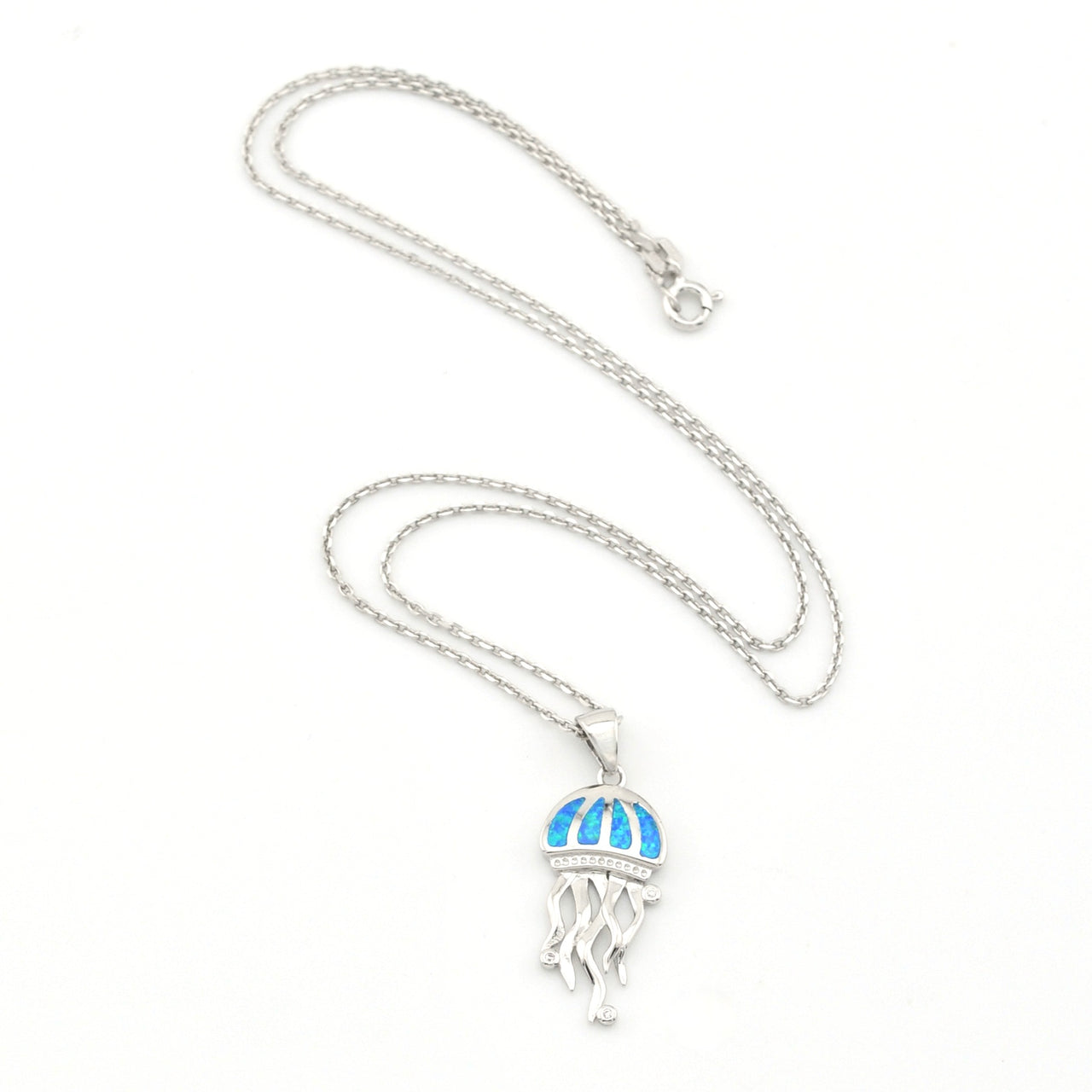 Silver necklace with a jellyfish pendant on a white background