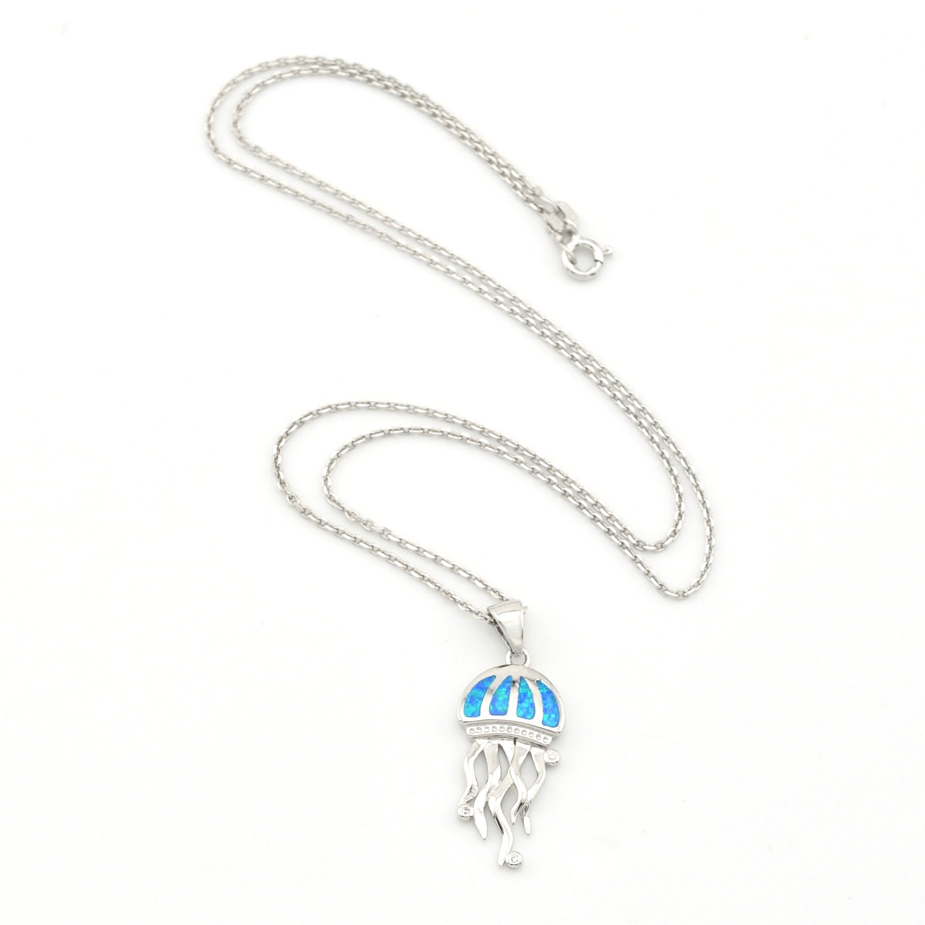 Silver necklace with a jellyfish pendant on a white background
