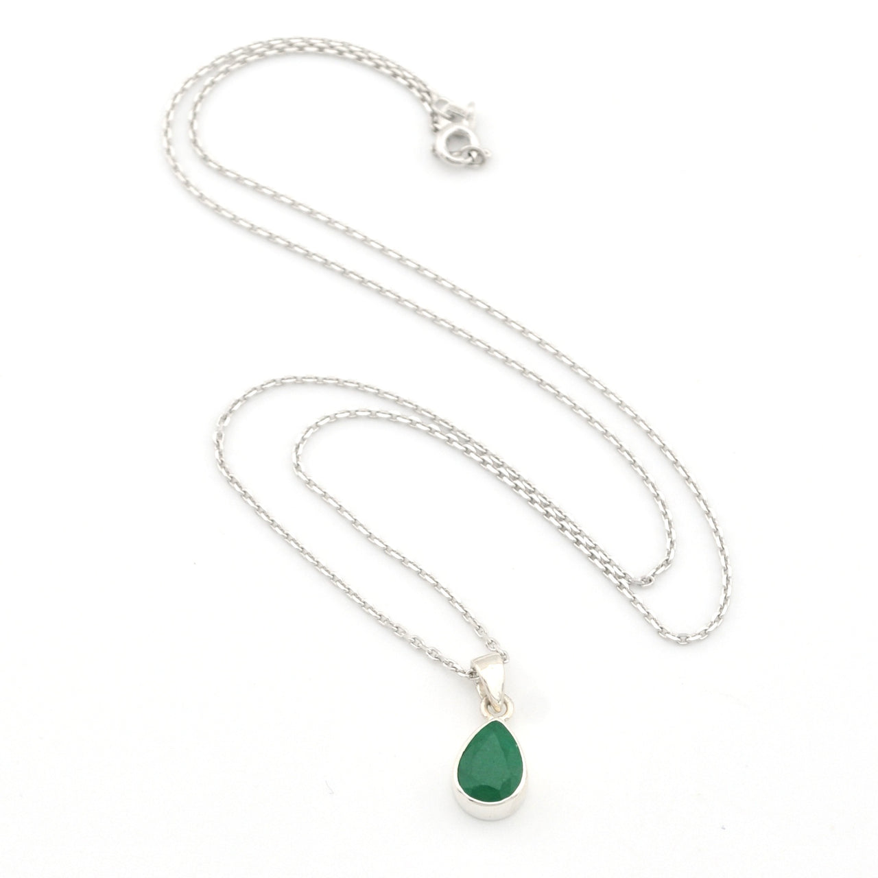 Necklace with a green teardrop pendant on a white background