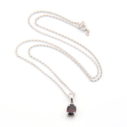 Silver necklace with a pendant on a white background