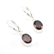 Silver Garnet 7x9mm Oval Dangle Earrings