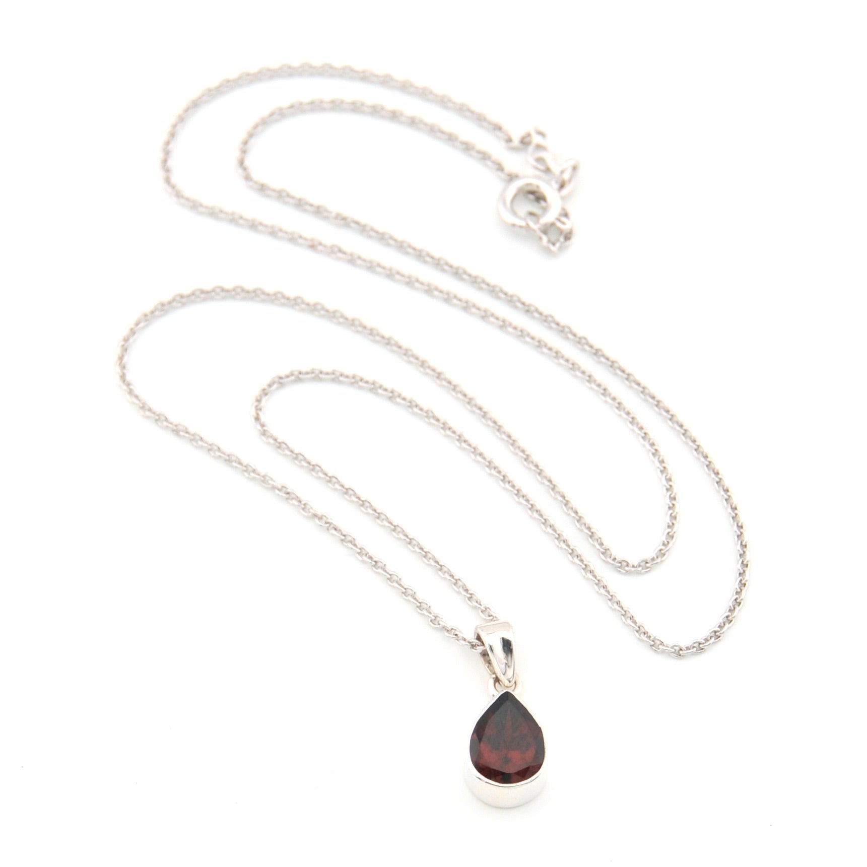 Necklace with a teardrop-shaped pendant on a white background