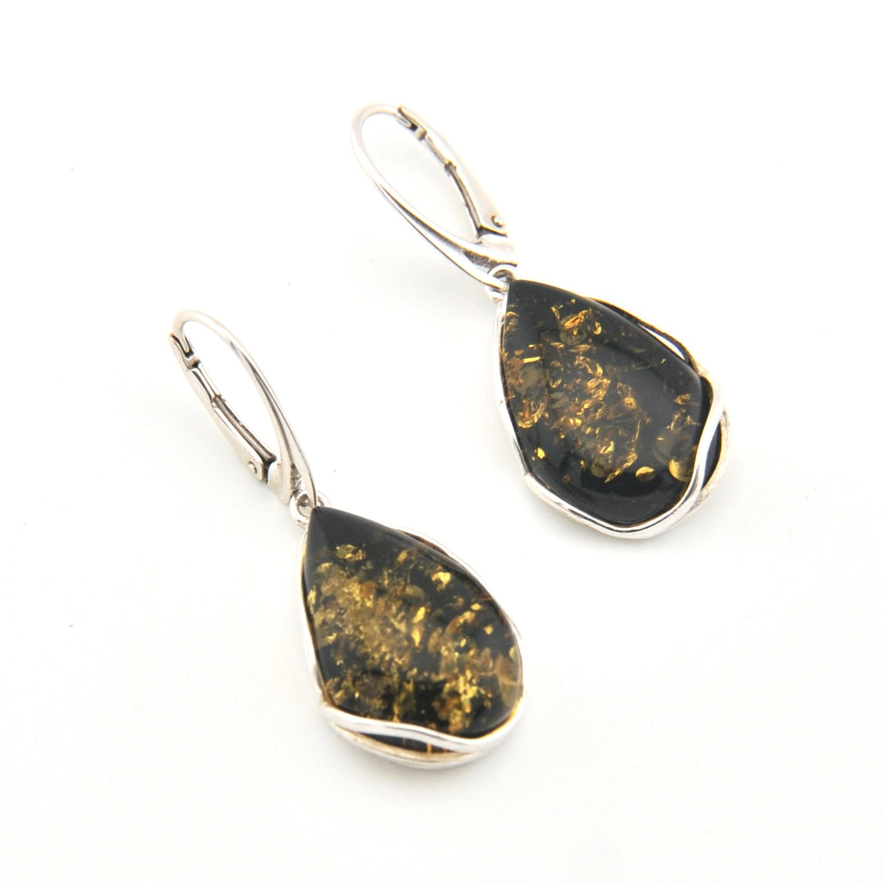 Teardrop-shaped earrings with black and gold speckled stones on a white background