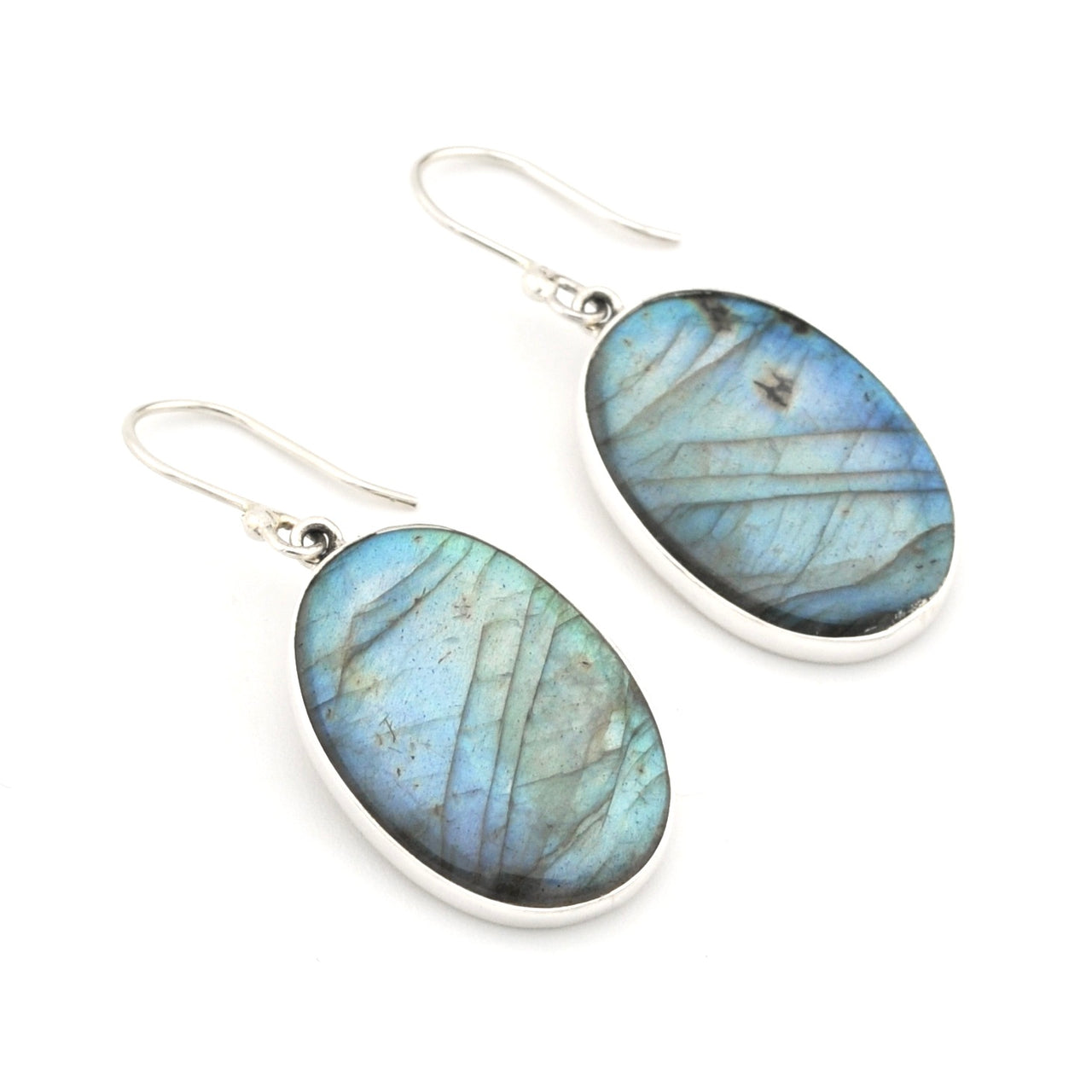 Labradorite earrings with silver hooks on a white background