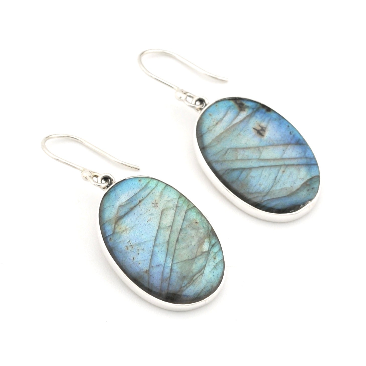 Labradorite earrings with silver hooks on a white background