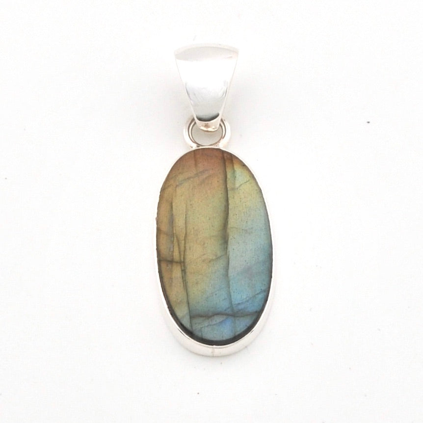 Labradorite pendant on a white background
