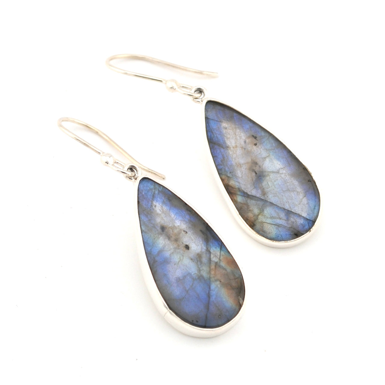 Teardrop-shaped labradorite earrings on a white background