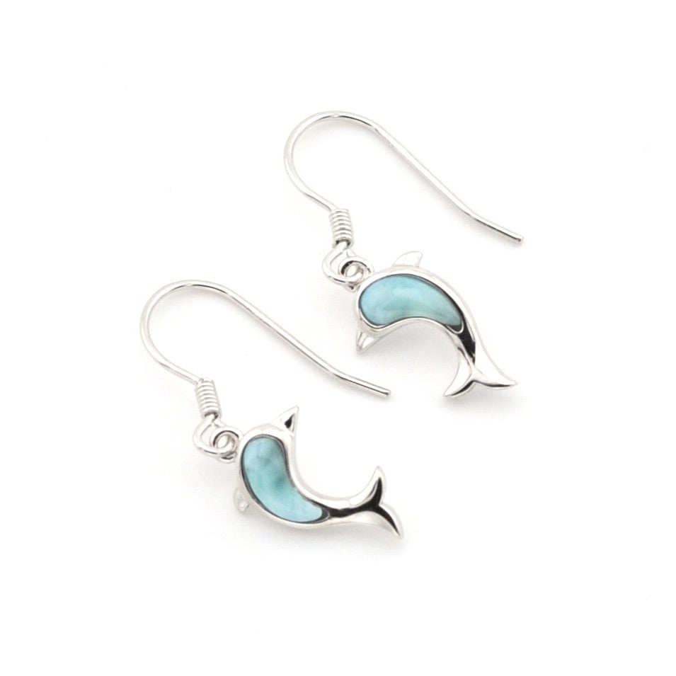 Dolphin-shaped earrings with blue accents on a white background