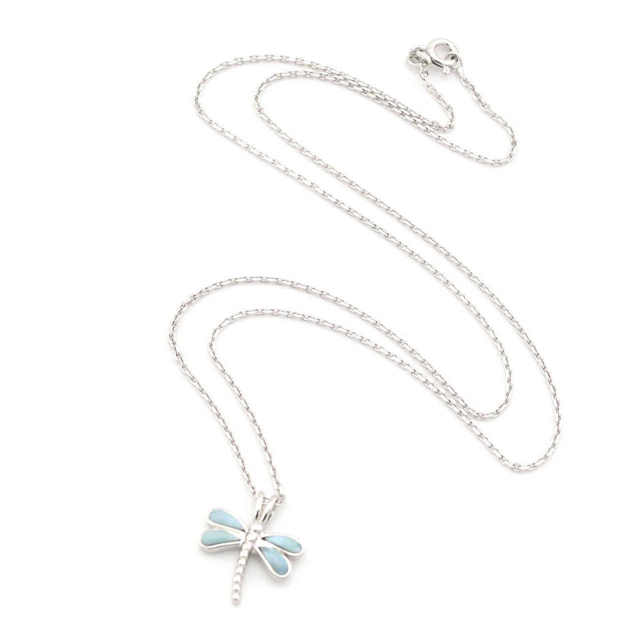 Silver necklace with a dragonfly pendant on a white background