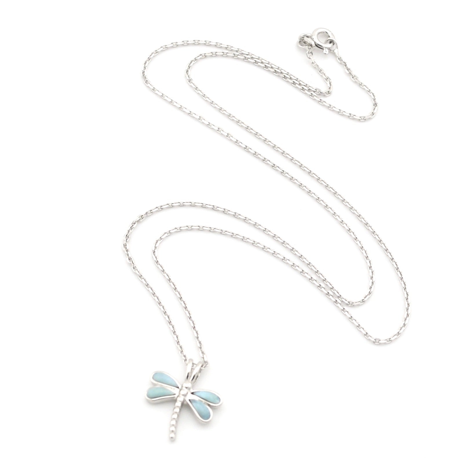 Silver necklace with a dragonfly pendant on a white background