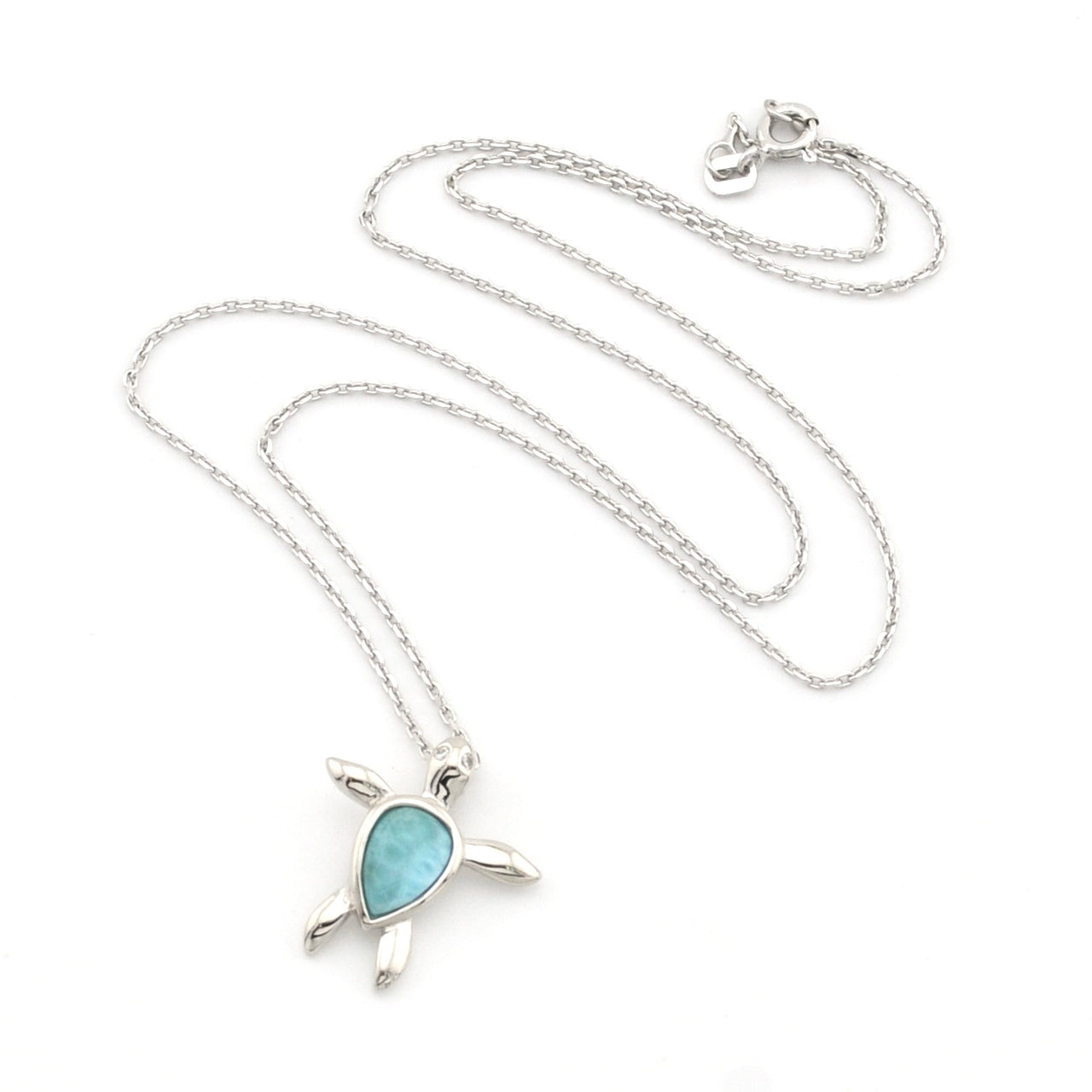 Silver necklace with a turtle pendant featuring a blue stone on a white background