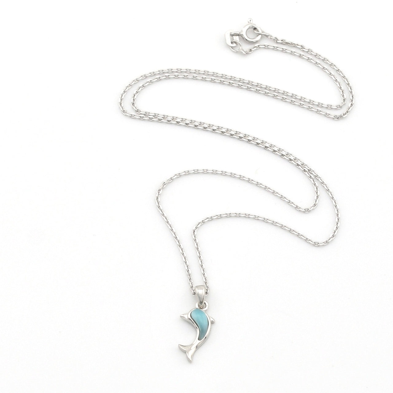 Silver necklace with a blue pendant on a white background