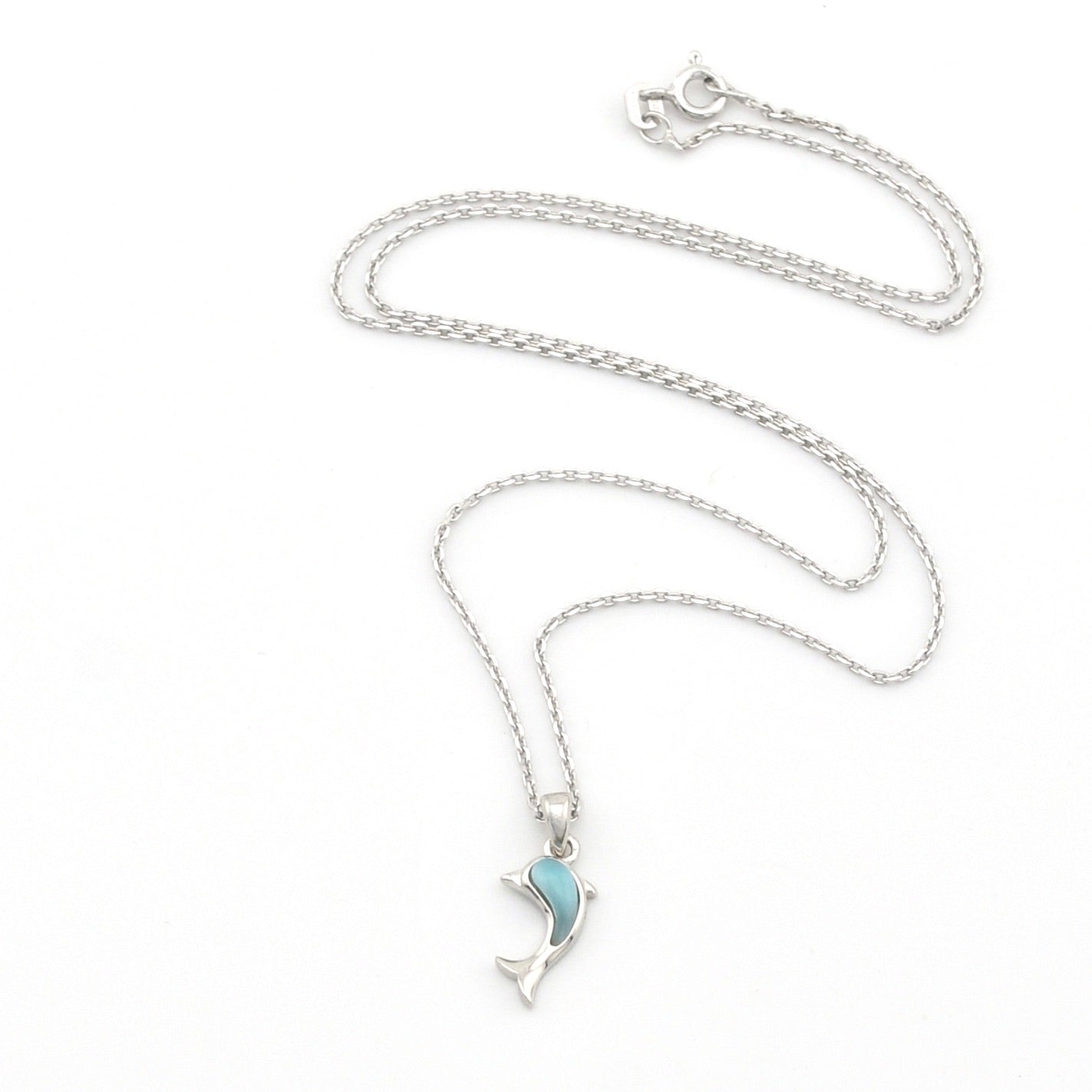 Silver necklace with a blue pendant on a white background