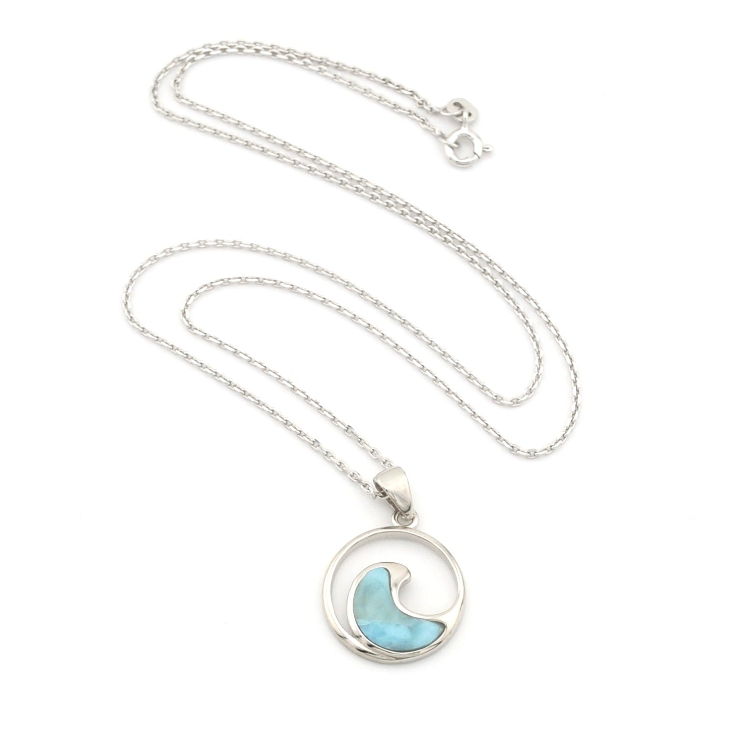 Necklace with a circular pendant featuring a blue wave design on a white background