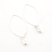Silver earrings on a white background