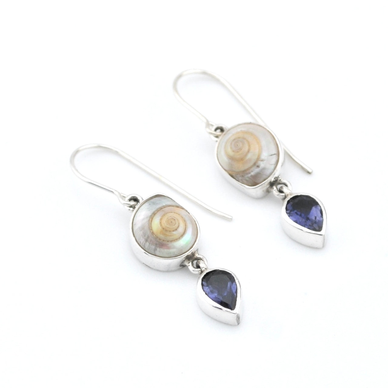 Silver earrings with shell and teardrop gemstones on a white background