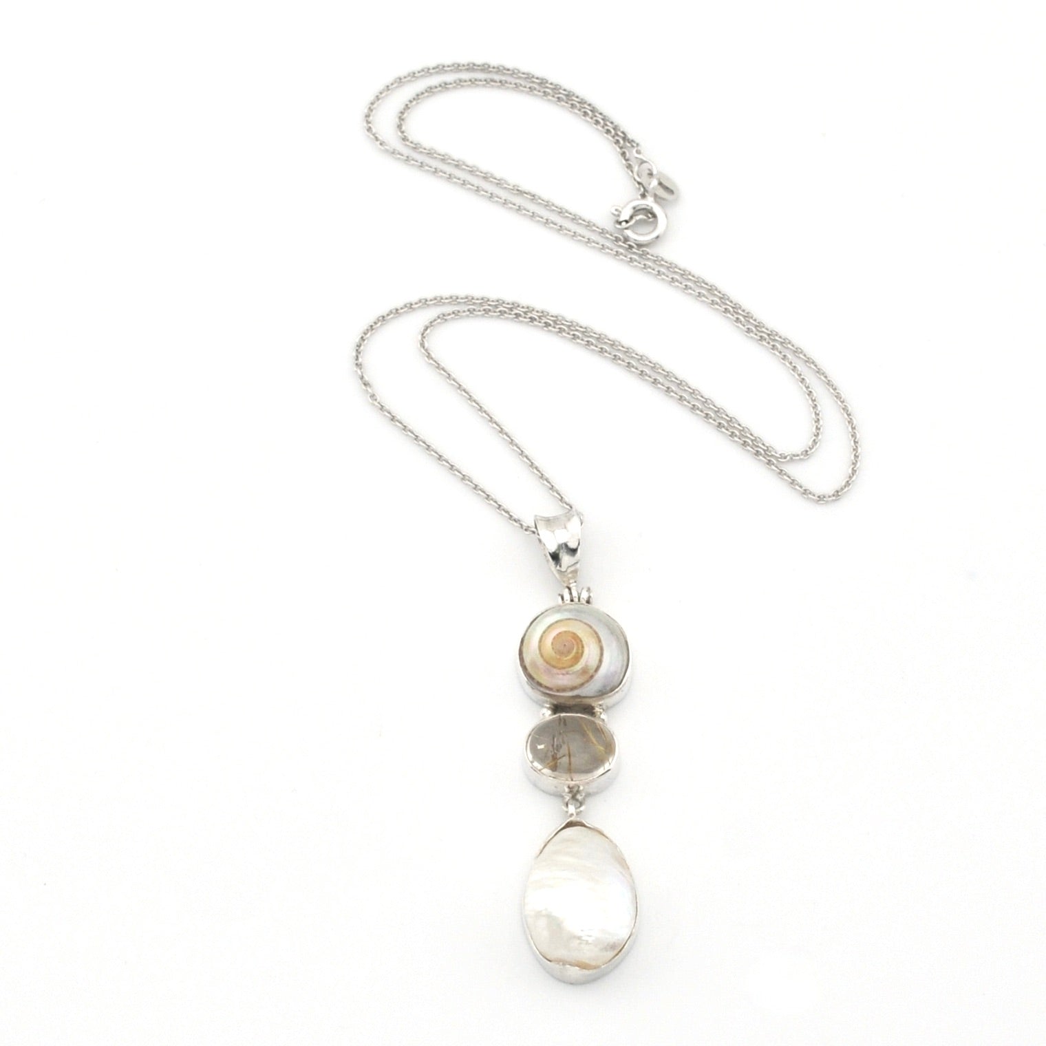 Necklace with a pendant featuring natural stones on a white background