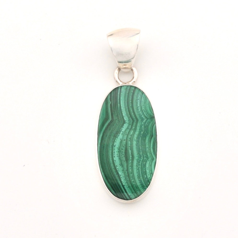 Green malachite pendant on a white background