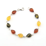 Bracelet with amber stones on a white background