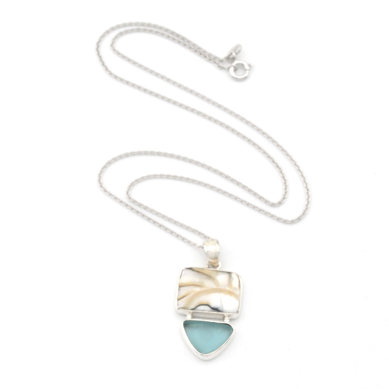 Necklace with a marbled pendant on a white background